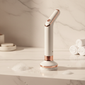 Cordless electric spin scrubber on marble bathroom countertop